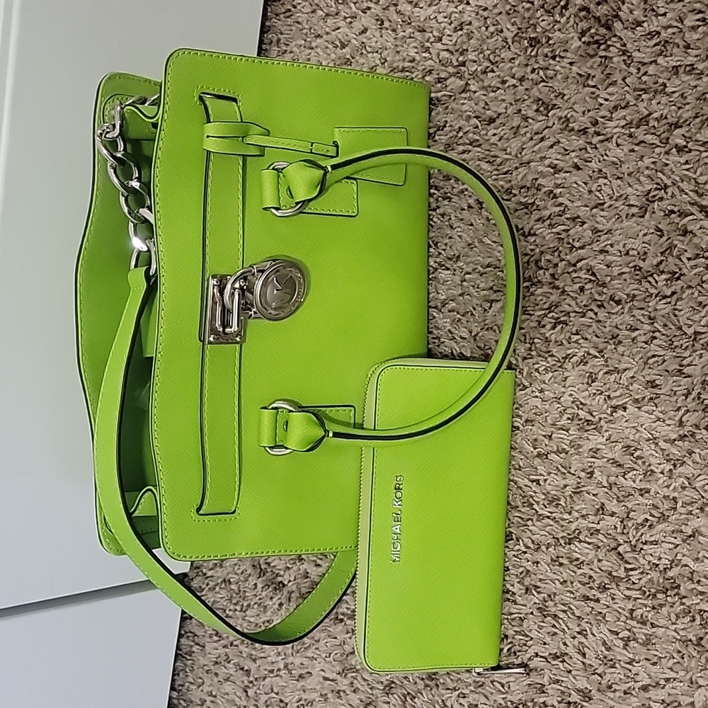 Authentic Michael Kors Hamilton East West with matching MK Wallet.